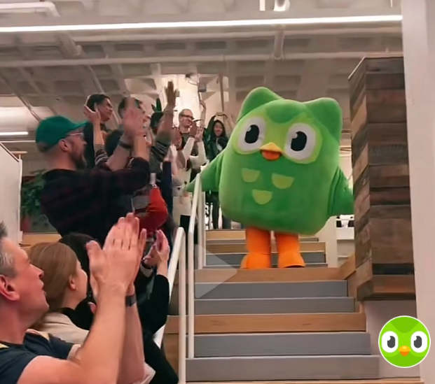 Duolingo owl mascot at a company event